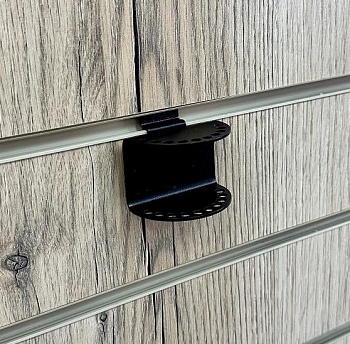 Кронштейн для держателей шапок на экономпанель A501